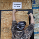 Ron White of Heat Mizer Glass boards up Holiday gas station located near the Brooklyn Center Police Department, as protests continue days after former police officer Kim Potter fatally shot Daunte Wright, in Brooklyn Center, Minnesota